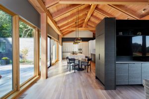 Interior flooded with natural light from floor-toceiling windows in The Avon House, designed by Fusion Designed Interiors.