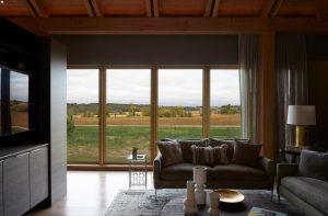 Harmonious connection between indoors and outdoors in The Avon House, fostering a private sanctuary, designed by Fusion Designed Interiors.