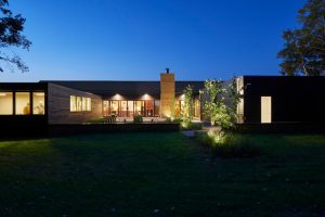 Shou Sugi Ban exterior of The Avon House in Avon, MN, designed by Fusion Designed Interiors, showcasing sustainable and modern design.