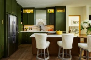 Contemporary kitchen design in Stillwater condo by Fusion Designed Interiors, integrating eco-friendly materials.
