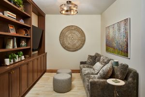 Living room detail in Stillwater, MN condo, featuring handcrafted artisan pieces selected by Fusion Designed Interiors.