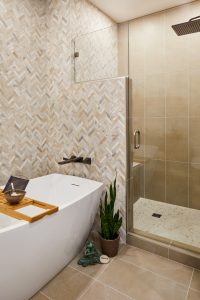 Modern bathroom in Stillwater condo, designed by Fusion Designed Interiors with sustainable fixtures.