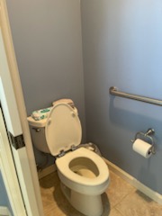 Eco-friendly bathroom design emphasizing holistic and sustainable elements by Fusion Designed Interiors.